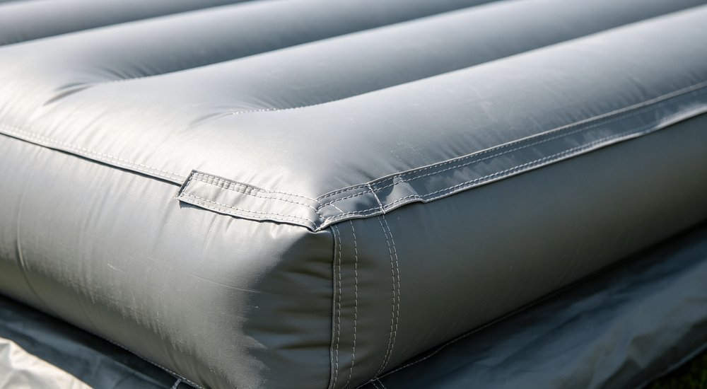300mm diameter air beam close-up, heavy duty size, product shot red and white inflatable emergency tent for disaster relief operations